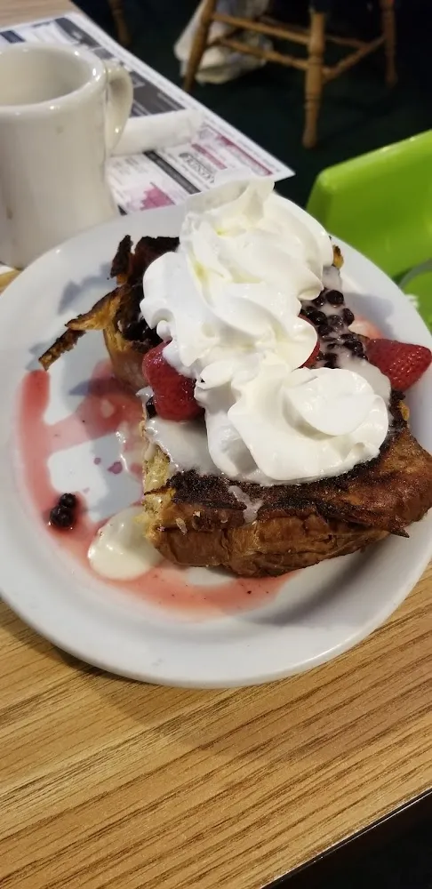 Grilled Cinnamon Roll w Strawberries Blueberry Lemon Glaze and Whipped Cream